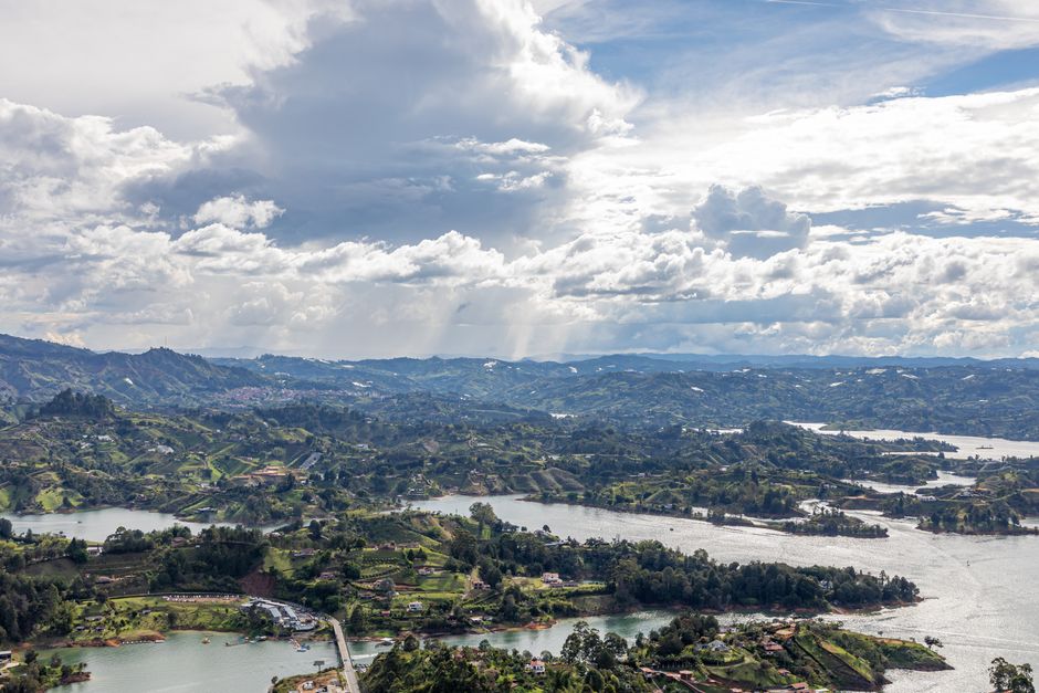 colombia — A breathtaking aerial view of the lakes and rolling hills in Guatapé, Antioquia, Colombia, under a d