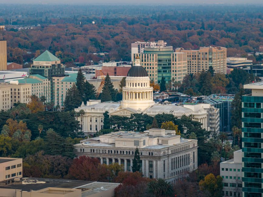 united states — Stunning aerial view of the iconic California State Capitol in Sacramento surrounded by cityscape.
